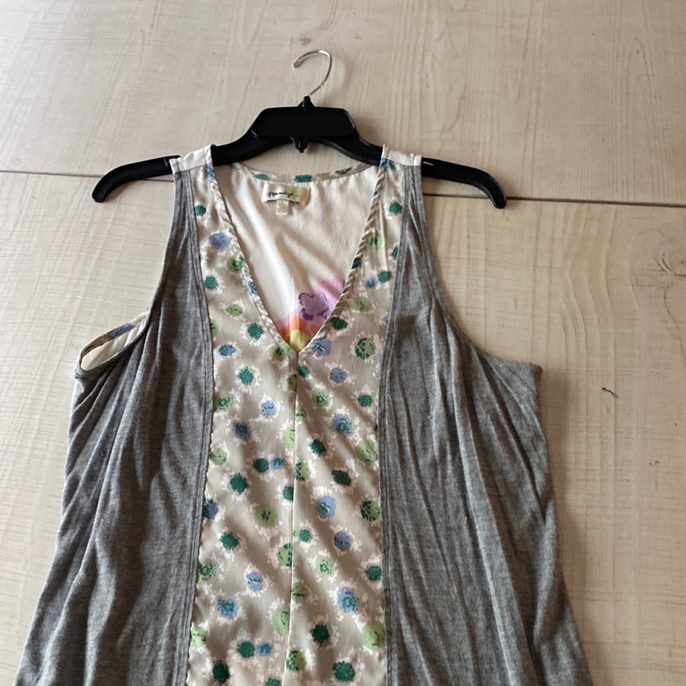 Anthropology sleeveless shirt….knit mixed with poly blend. Large